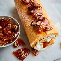 Salted caramel, cream & pecan brittle swiss roll - Clarence Court Recipes