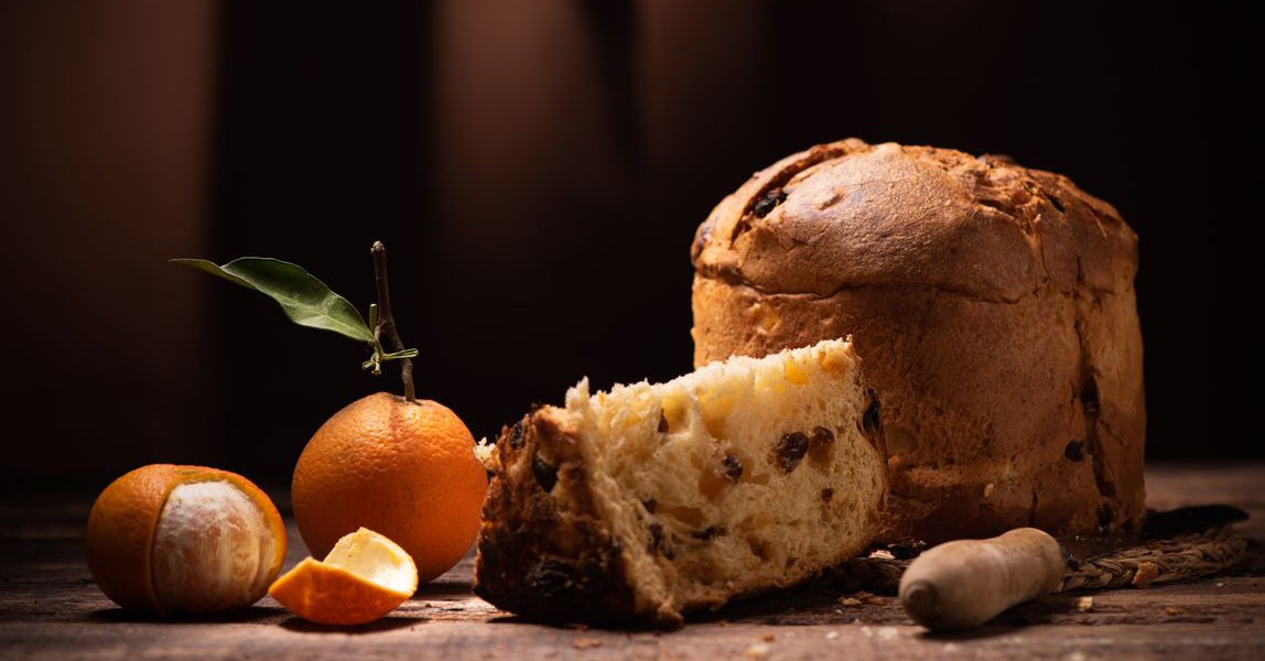 Pannetone Christmas cake on a dark bacground