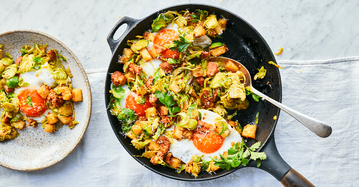 Pan of Clarance Court eggs hearty burford brown hash from Eggstravaganza cookbook