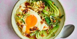 Ramen bowl topped with a Clarence Court Burford buff fried egg
