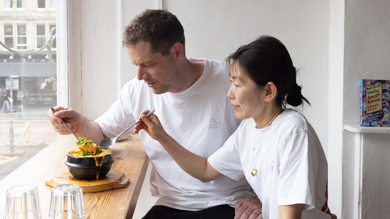 This chapter of Lunch with Loftus unfolds in Bristol at Bokman's, the laid-back restaurant devoted to authentic Korean cuisine. David Loftus steps into the kitchen with husband-and-wife duo Duncan Robertson and Kyu Jeong Jeon, the creative force behind Bokman’s fermentation-led Korean flavours. David looks on as the pair prepare Volcanic Eggs: a soufflé-omelette fusion known as Gyeran Jjim, with our Burford Brown eggs at its heart.