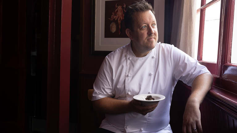 This chapter of Lunch with Loftus unfolds at The Devonshire - Soho’s most sought-after spot. Join the inimitable David Loftus as he meets head chef Ashley Palmer Watts for something truly special: Truffled Eggs. A poached Clarence Court Burford Brown nestled in a soft egg emulsion, with truffle juice mayo, Parmesan and Ibérico bacon cream, golden croutons, a flurry of shaved truffle, and just the right pinch of salt and pepper.