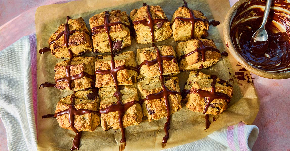 Scones with chocolate crossed over the top of them to look like hot cross buns
