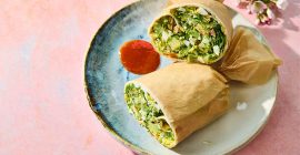 Protein wrap with chopped avocado, egg, Dr Wills avocado mayo and buffalo sauce